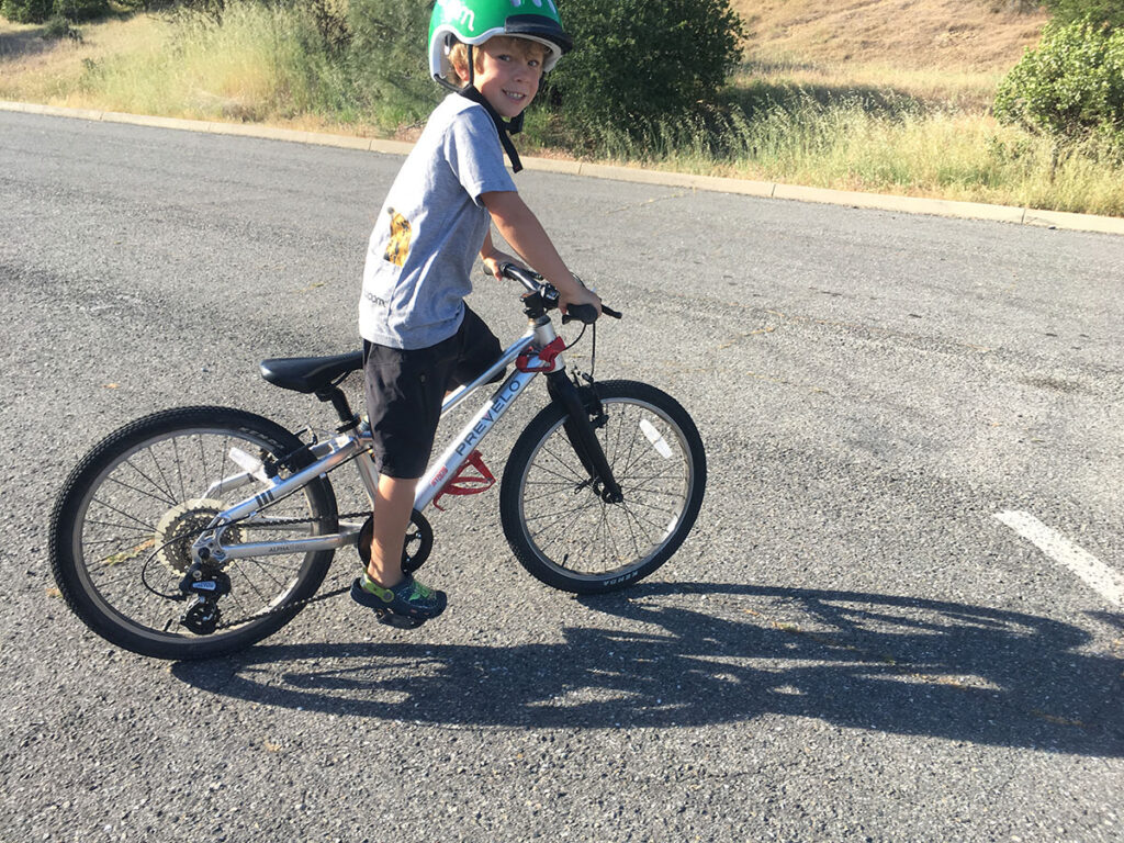 Image of 8 year old kid on bike