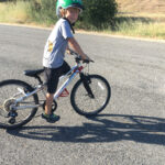 Image of 8 year old kid on bike
