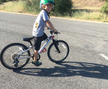 Image of 8 year old kid on bike